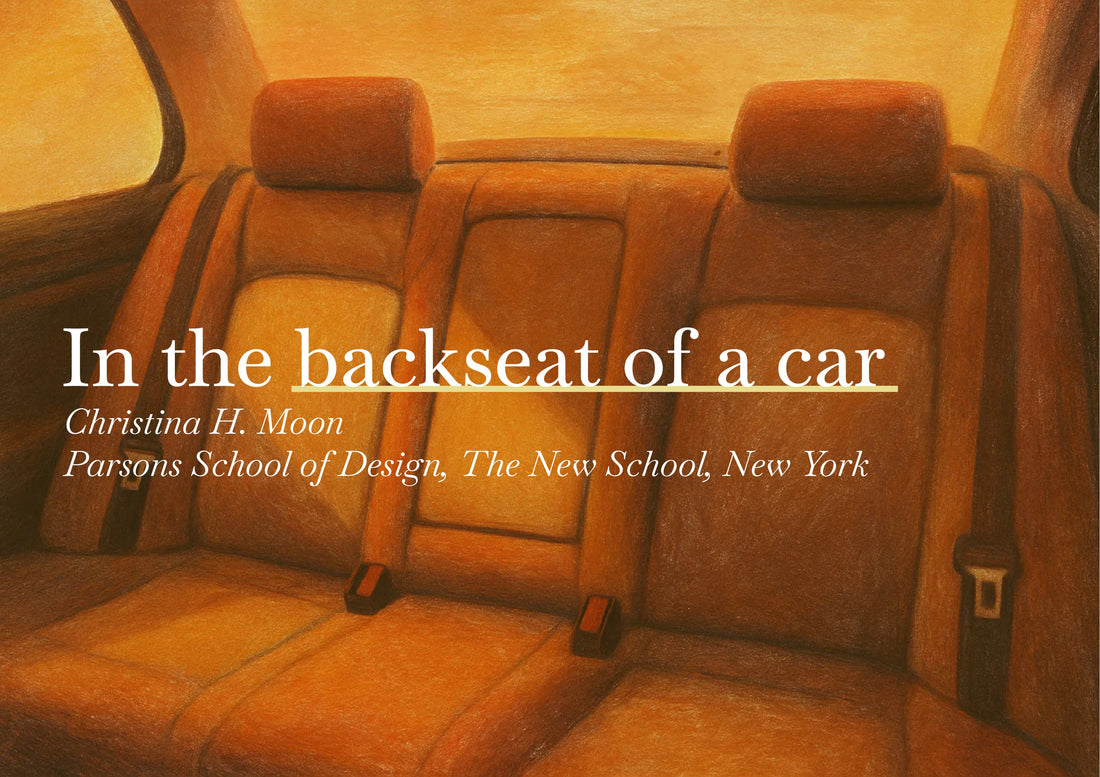 In the backseat of a car